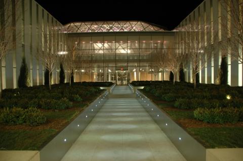 Night time image of the outdoor garden that shows the impressive use of light.