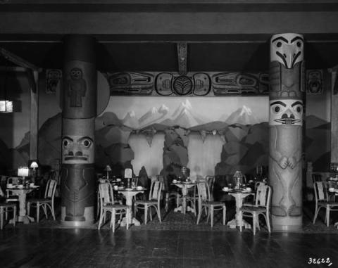 This lounge is ornamented with native elements such as carved totem poles and wall paintings