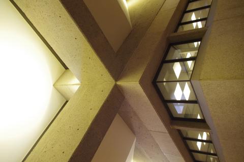 rectilinear concrete interior with lighting  
